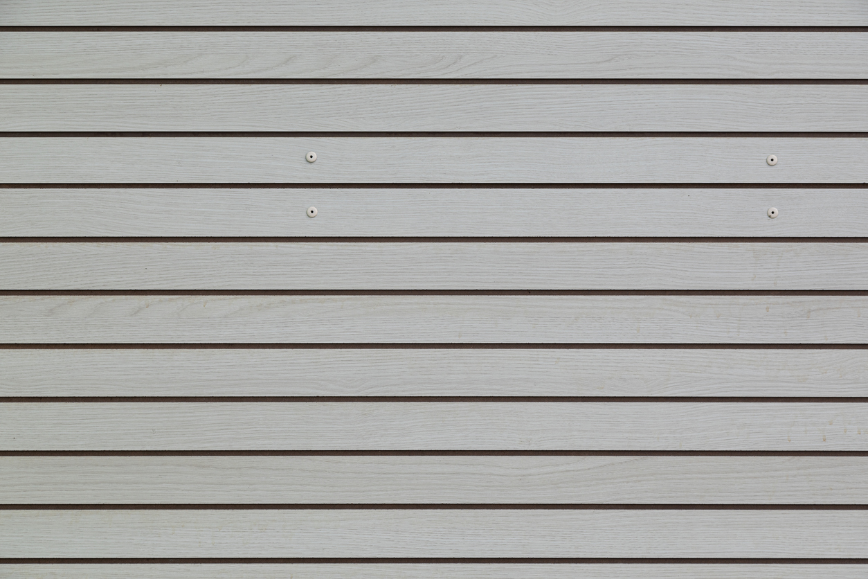 Horizontally placed wooden siding planks 