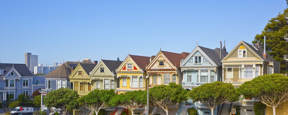 A row of colorful victorian homes in the Bay Area that includes Dublin, Livermore, San Ramon, and Pleasanton