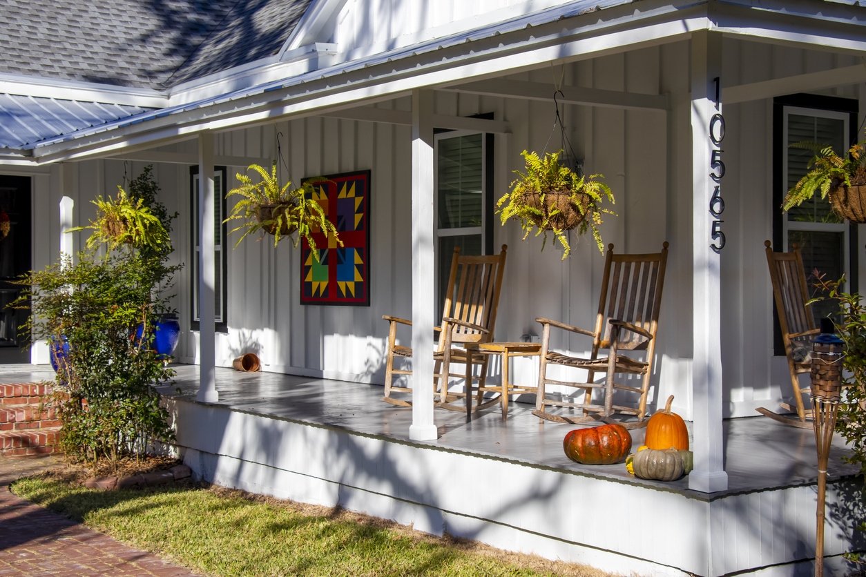 The front porch with an epoxy floor covering of a renovated wood-frame house in the Livermore area.